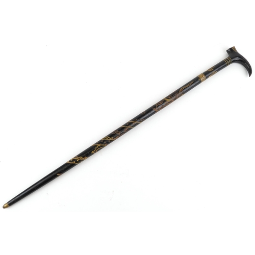 660 - Chinese ebonised walking swordstick carved with a dragon chasing the flaming pearl, 96cm in length