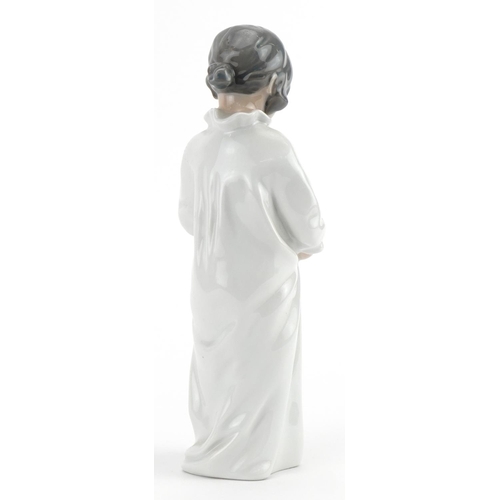 2270 - Royal Copenhagen, Danish porcelain figure of a young girl number 408, 20cm high