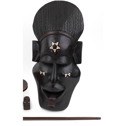 2602 - Tribal interest wood carvings including large face mask with bone inlay and stool, the largest 98cm ... 