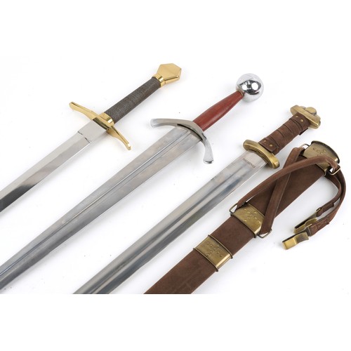 1457 - Three medieval style swords including one with sheath, the largest 24.5cm in length