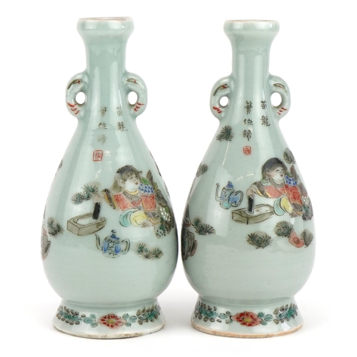 463 - Pair of Japanese porcelain vases hand painted with a father and children, signed with calligraphy an... 