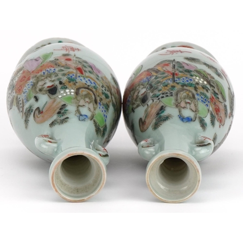 463 - Pair of Japanese porcelain vases hand painted with a father and children, signed with calligraphy an... 