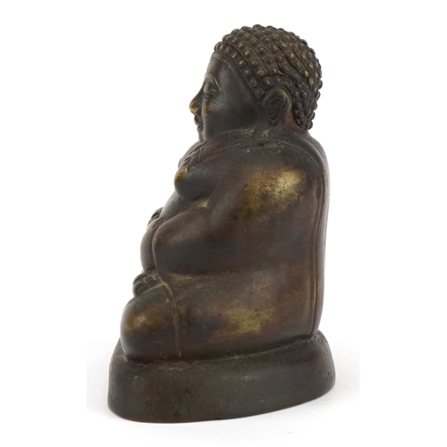 655 - Chino Tibetan patinated bronze figure of seated Buddha, 11.5cm high