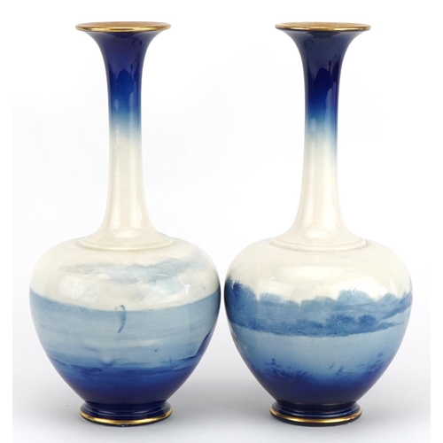 437 - Pair of Royal Doulton children's series vases, numbered 1748 and 1749 to the bases, each 26cm high