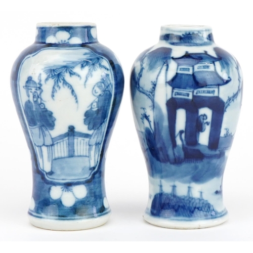 650 - Two Chinese blue and white porcelain baluster vases hand painted with figures, the largest 10cm high