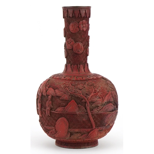 397 - Chinese cinnabar lacquered vase carved with figures in a landscape, 25cm high