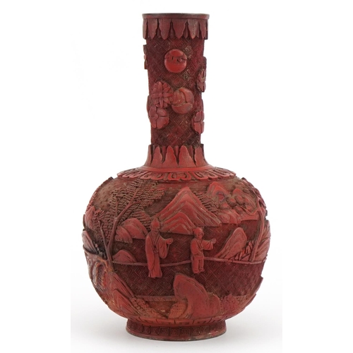 397 - Chinese cinnabar lacquered vase carved with figures in a landscape, 25cm high