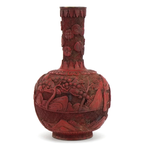 397 - Chinese cinnabar lacquered vase carved with figures in a landscape, 25cm high