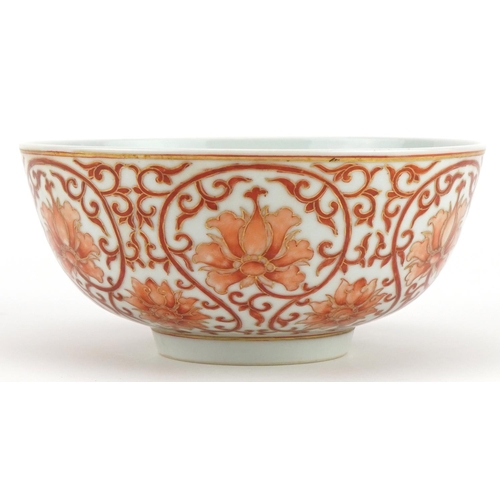 137 - Chinese porcelain footed bowl hand painted in iron red with flower heads amongst scrolling foliage, ... 