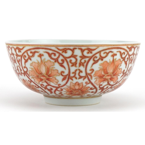 137 - Chinese porcelain footed bowl hand painted in iron red with flower heads amongst scrolling foliage, ... 