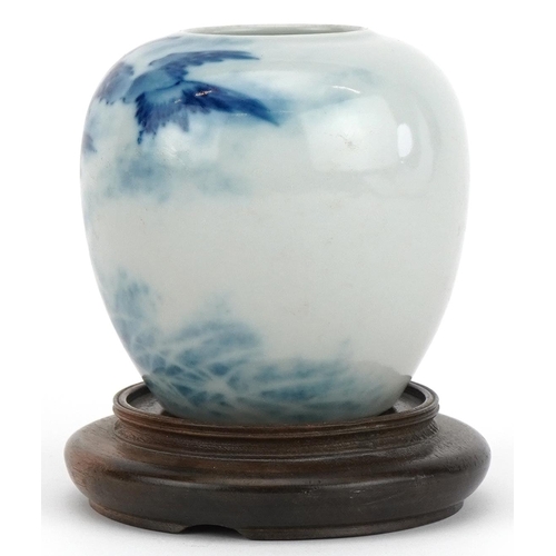 648 - Chinese blue and white porcelain vase with hardwood stand hand painted with birds above waves, overa... 