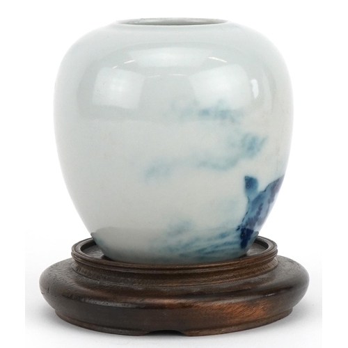 648 - Chinese blue and white porcelain vase with hardwood stand hand painted with birds above waves, overa... 