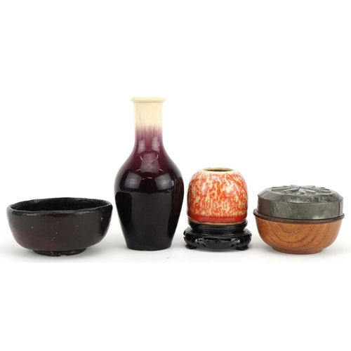 674 - Chinese sundry items including a beehive water pot on hardwood stand having a spotted orange glaze, ... 