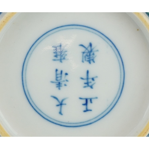 303 - Two Chinse doucai porcelain dishes, each hand painted with a dragon chasing the flaming pearl amongs... 