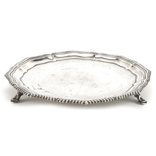 452 - Hawksworth, Eyre & Co Ltd, Victorian circular silver three footed card tray, Sheffield 1896, 15cm in... 