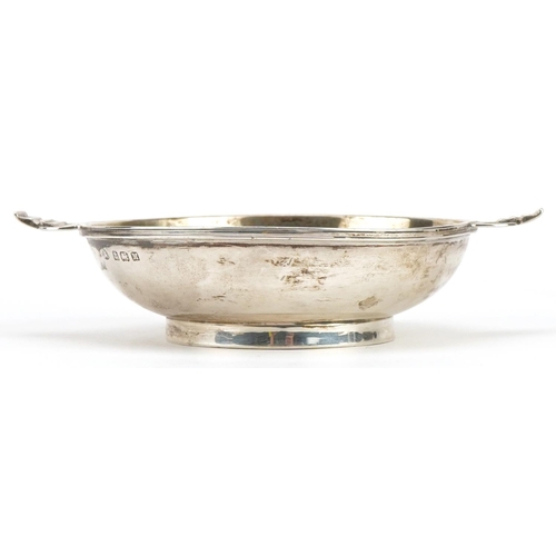 160 - Adie Brothers Ltd, Arts & Crafts style circular silver quaich with twin handles, Birmingham 1936, 13... 