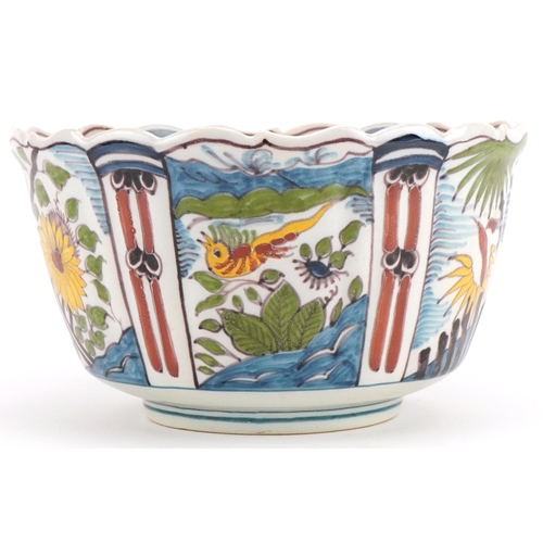 2719 - Makkum, Dutch Maiolica bowl hand painted with birds and flowers, 21cm in diameter