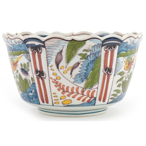 2719 - Makkum, Dutch Maiolica bowl hand painted with birds and flowers, 21cm in diameter