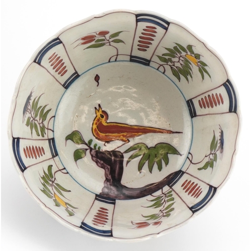 2719 - Makkum, Dutch Maiolica bowl hand painted with birds and flowers, 21cm in diameter