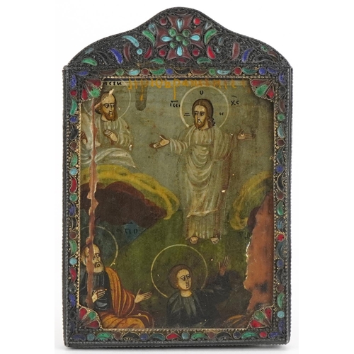 585 - Rectangular Russian icon hand painted with saints housed in an unmarked silver and champleve enamel ... 