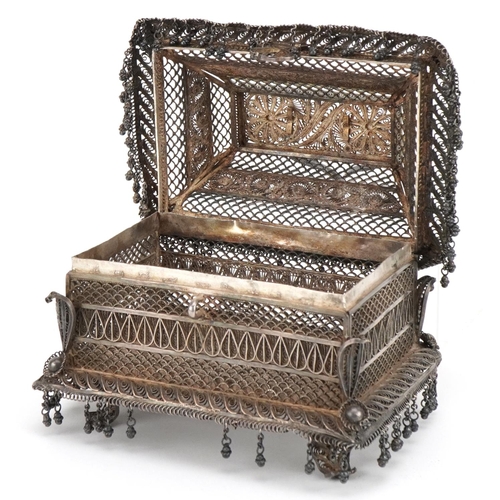 98 - Indian Goa silver filigree table casket with tassel drops, the plaque impressed M L Bros CTC to the ... 