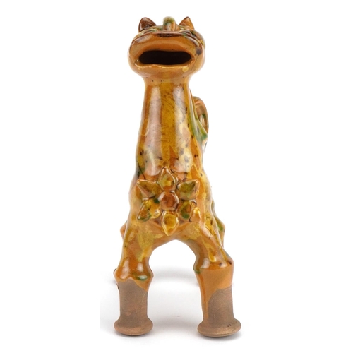 279 - Turkish Canakkale pottery ewer having a yellow and green glaze, in the form of a lion, 20cm high