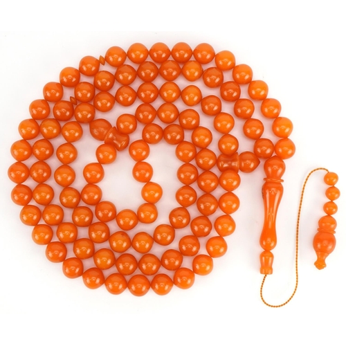 2574 - Turkish butterscotch amber coloured tesbih prayer bead necklace, 162cm in length