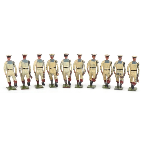 1130 - Ten Britains hand painted lead The US Navy White Jacket soldiers with articulated arms, with paper l... 