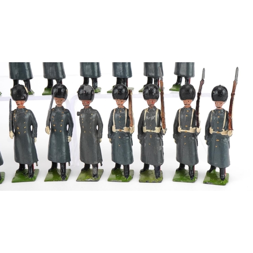 1133 - Eighteen Britains hand painted lead Grenadier Guards in Winter Dress soldiers with articulated arms