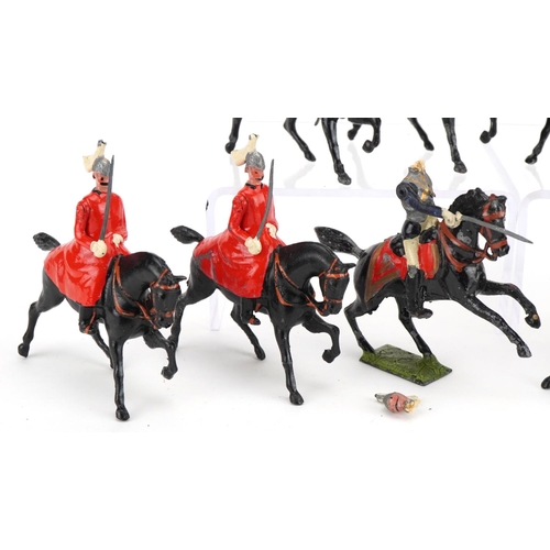 1125 - Ten Britains hand painted lead soldiers on horseback including Mounted Life Guards and Royal Horse G... 