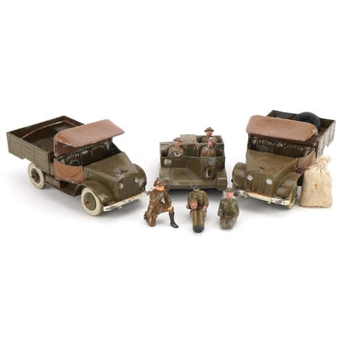 1135 - Two Britains hand painted lead military interest Beetle lorries and a Bren Gun carrier, with paper l... 