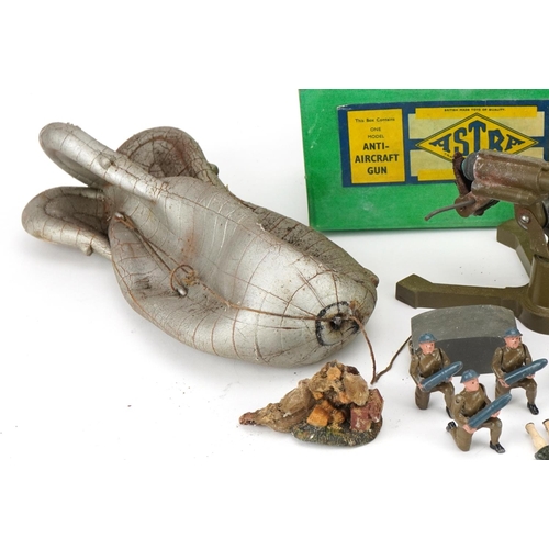 1126 - Two vintage Astra anti-aircraft guns with boxes, various scenery and a Britains barrage balloon