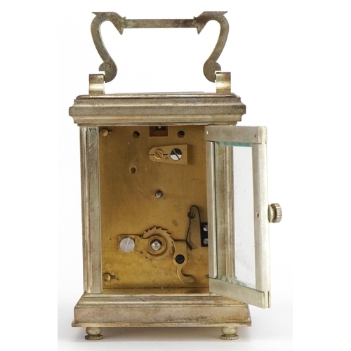 2468 - Miniature silver plated carriage clock with swing handle and enamelled dial having Roman numerals, 8... 