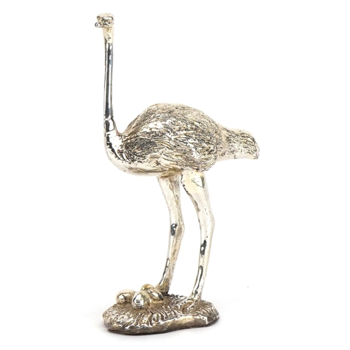 637 - Sterling silver filled study of an ostrich with eggs, 15cm high