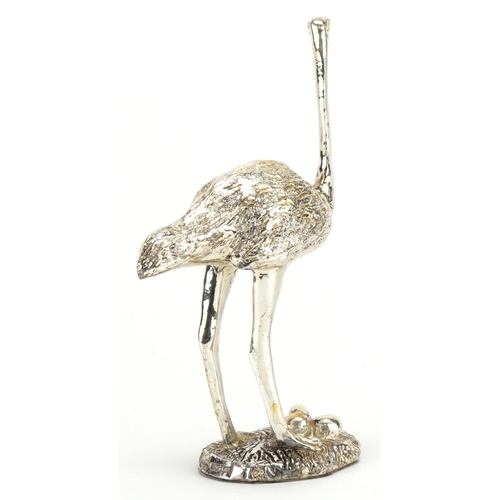 637 - Sterling silver filled study of an ostrich with eggs, 15cm high