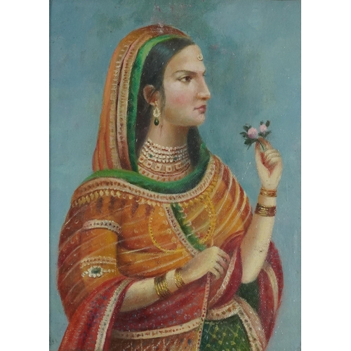 2132 - Top half portrait of an Indian female in traditional dress, oil, housed in a gesso frame, glazed, 23... 