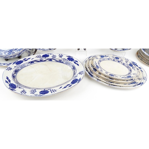 504 - Victorian blue and white Dresden pattern dinnerware including a large oval meat platter, graduated s... 