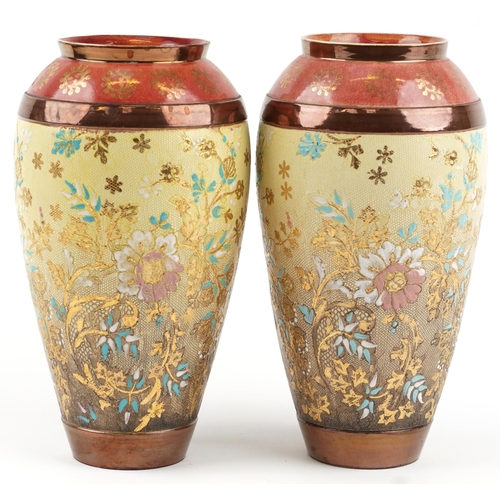 436 - Royal Doulton, Pair of Doulton Lambeth Slater's Patent vases hand painted with stylised flowers, imp... 