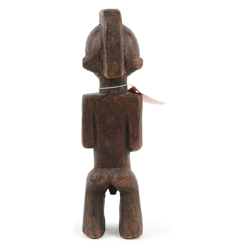 409 - African tribal interest Kavango lacquered carved wood fertility figure from Andara Mission, Caprivi ... 