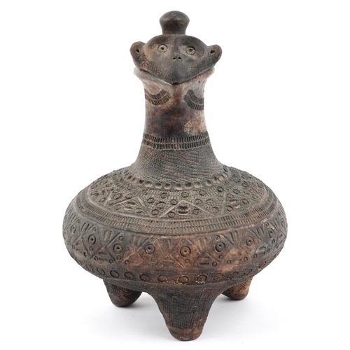 415 - African tribal interest Maragoli clay three footed vessel with animalia lid profusely incised with g... 