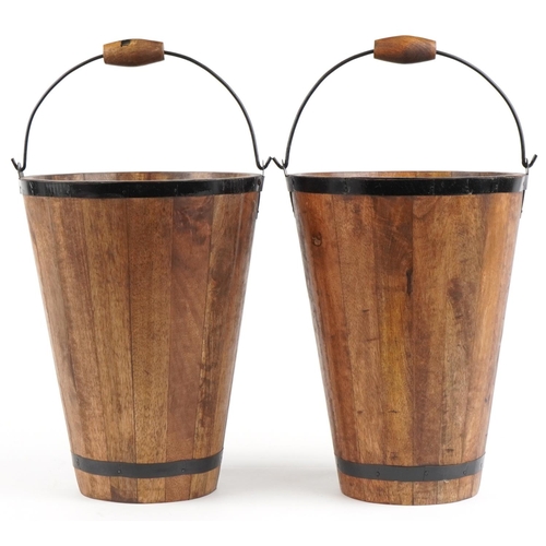 577 - Pair of Bollinger design hardwood Champagne buckets with metal mounts and swing handles, each 40cm h... 