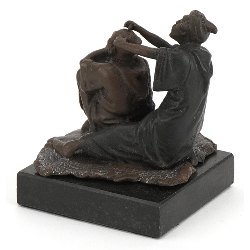 2612 - After Franz Xaver Bergmann, cold painted bronze figure group of a barber raised on a square black ma... 