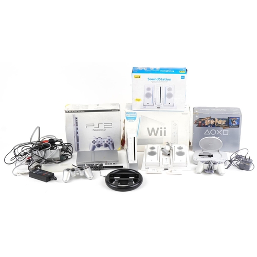 1205 - Vintage and later games consoles and accessories with boxes including Sony PlayStation 1, Sony PlayS... 