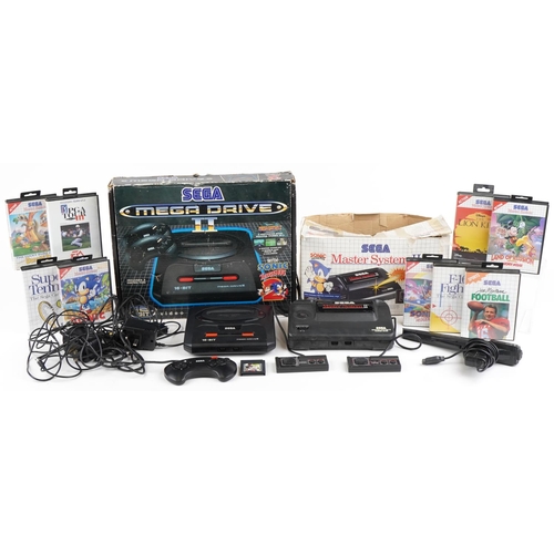 1199 - Vintage Sega games consoles and games including Sega Mega Drive II with box, Sega Master System II w... 