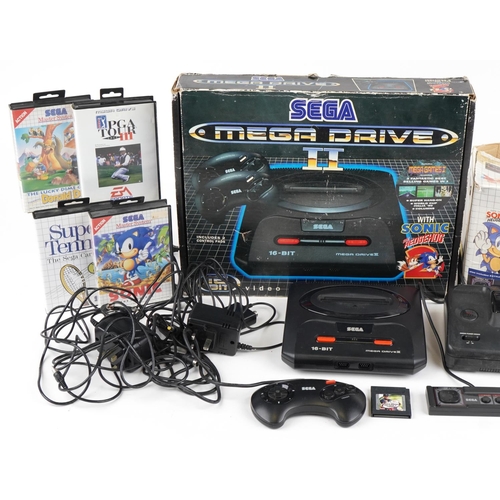 1199 - Vintage Sega games consoles and games including Sega Mega Drive II with box, Sega Master System II w... 