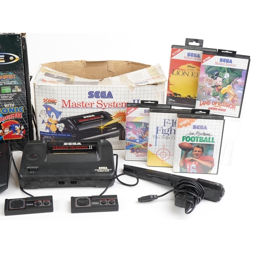 1199 - Vintage Sega games consoles and games including Sega Mega Drive II with box, Sega Master System II w... 