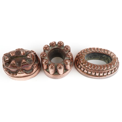 30 - Three Victorian copper jelly moulds including two by Benham & Froud numbered 331 and 615, the larges... 