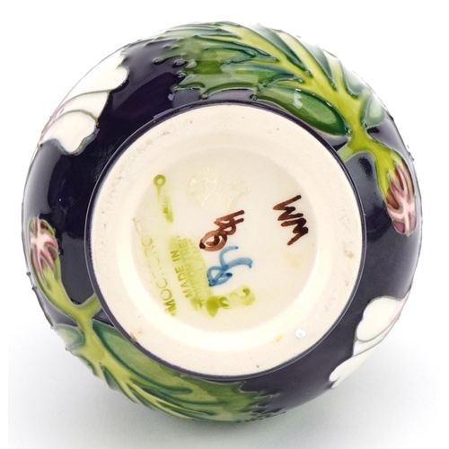 79 - Moorcroft pottery baluster vase hand painted in the Mallow pattern, painted marks to the base, 14cm ... 