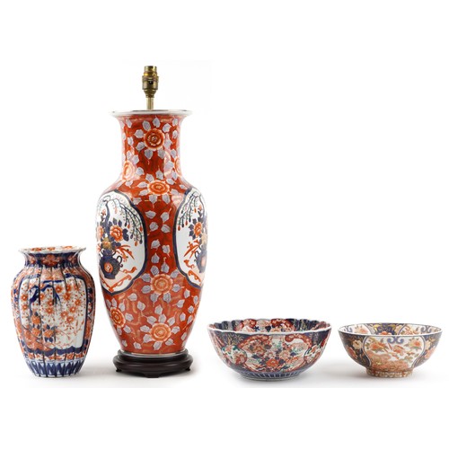 2446 - Japanese Imari porcelain including a large vase table lamp, fluted vase hand painted with flowers an... 