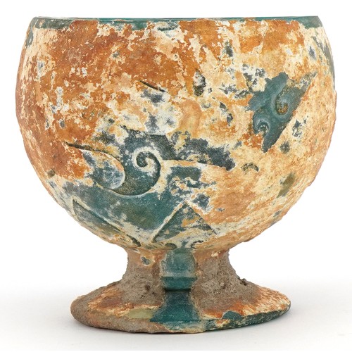 680 - Chinese turquoise glass goblet with relief decoration, 9cm high